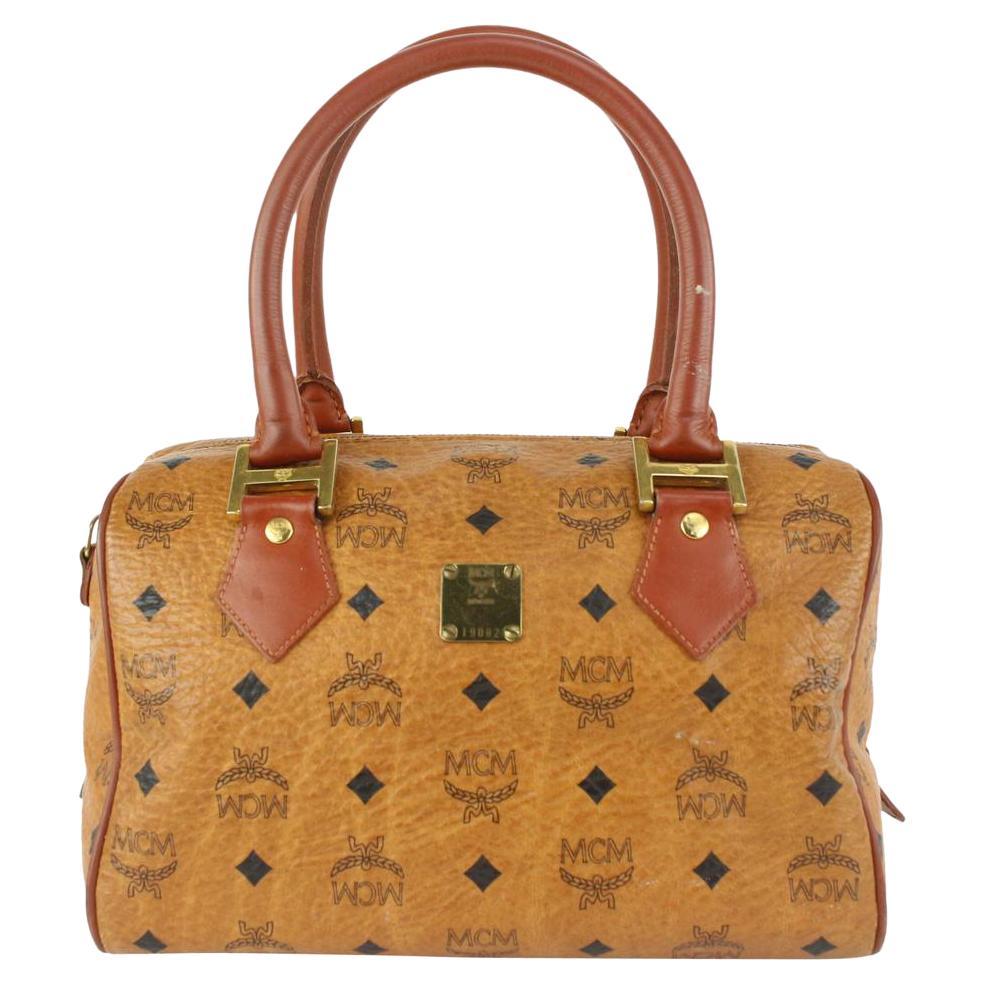 MCM Mini Kelly in Tan Logo Leather at 1stDibs | mcm kelly, mcm kelly ...