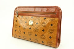 MCM Pochette Visetos à monogramme cognac 55 m218s