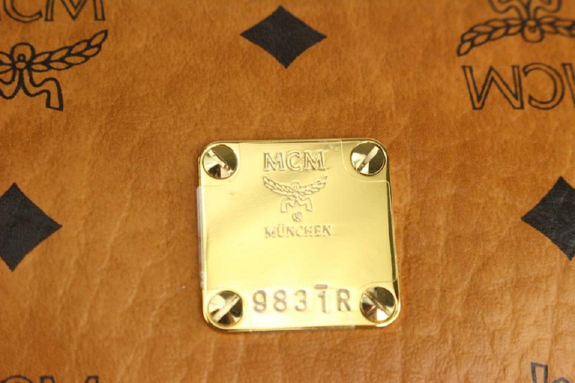 MCM Cognac Monogramm Visetos Traveler Weekender Duffle mit Riemen 1015m54 im Zustand „Neu“ im Angebot in Dix hills, NY