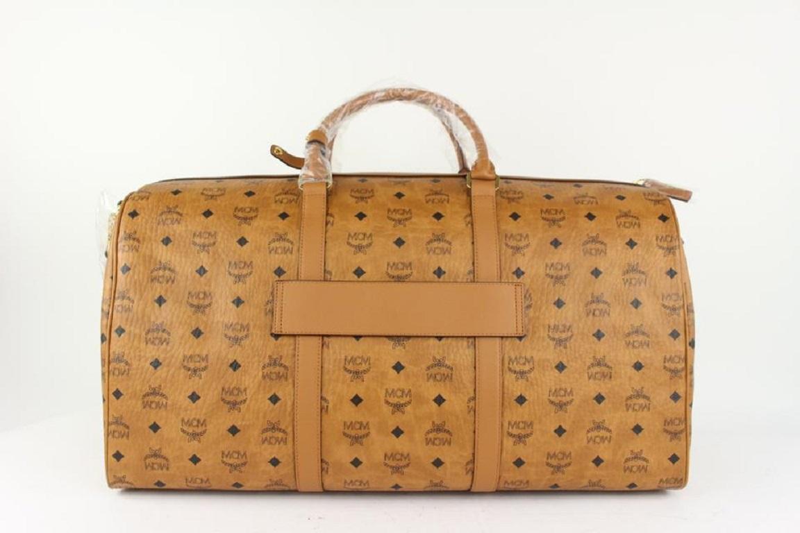 MCM Cognac Monogram Visetos Traveler Weekender Duffle with Strap 1015m54 In New Condition For Sale In Dix hills, NY
