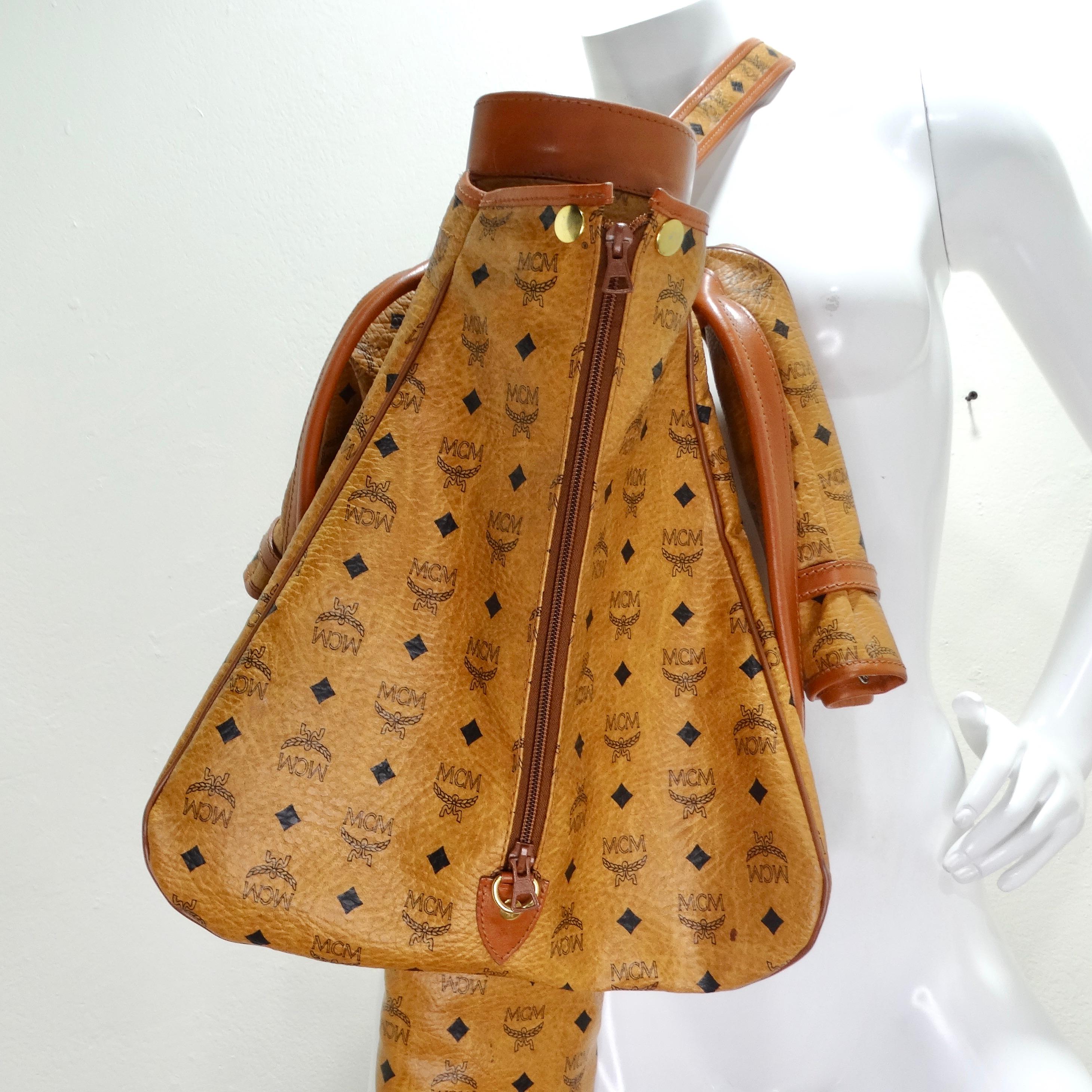 Introducing the MCM Cognac Visetos 1980s 5 Club Practice Course Golf Club Bag – a vintage masterpiece that seamlessly blends luxury fashion with functional design. Elevate your golf game with this stylish and iconic addition to your collection.