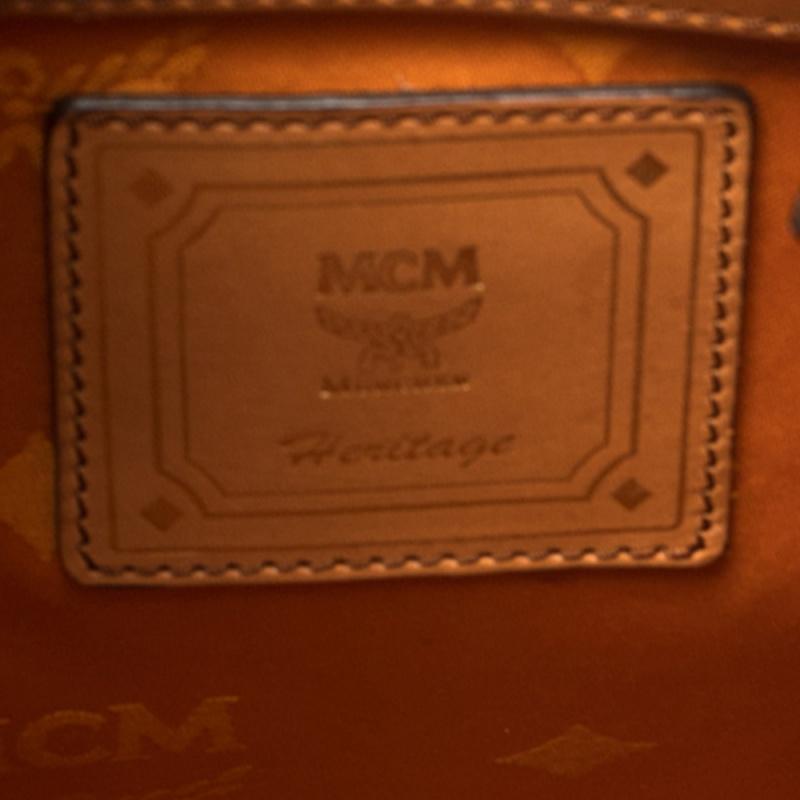 MCM Cognac Visetos Coated Canvas and Leather Brandenburg Drawstring Backpack In Good Condition In Dubai, Al Qouz 2