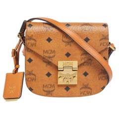 MCM - Sac à bandoulière Patricia en toile et cuir enduite Visetos couleur cognac