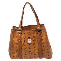 MCM Shopper-Tasche aus beschichtetem Segeltuch und Leder in Cognac mit Visetos