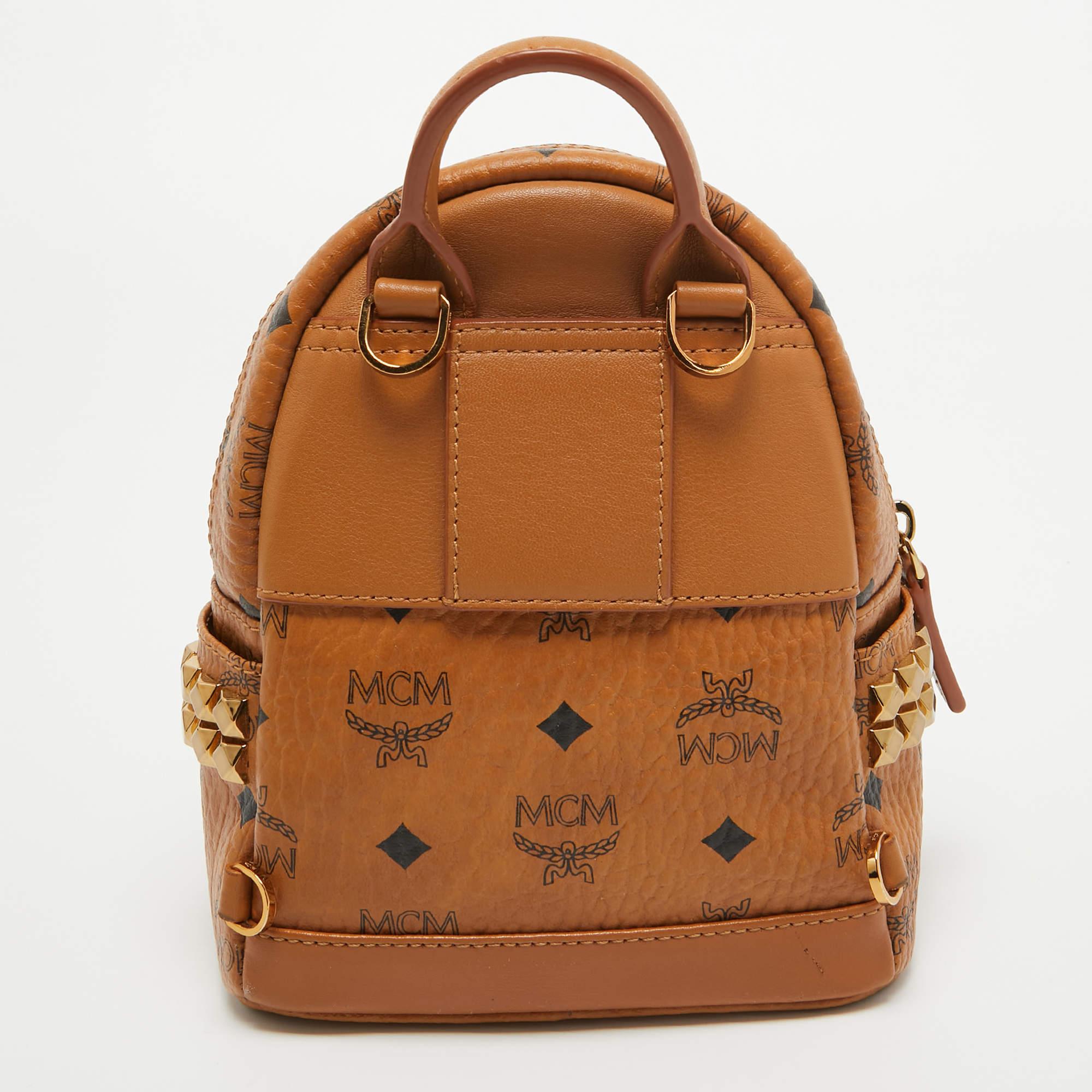 Perfect for conveniently housing your essentials in one place, this MCM mini backpack is a worthy investment. It has notable details and offers a look of luxury.

