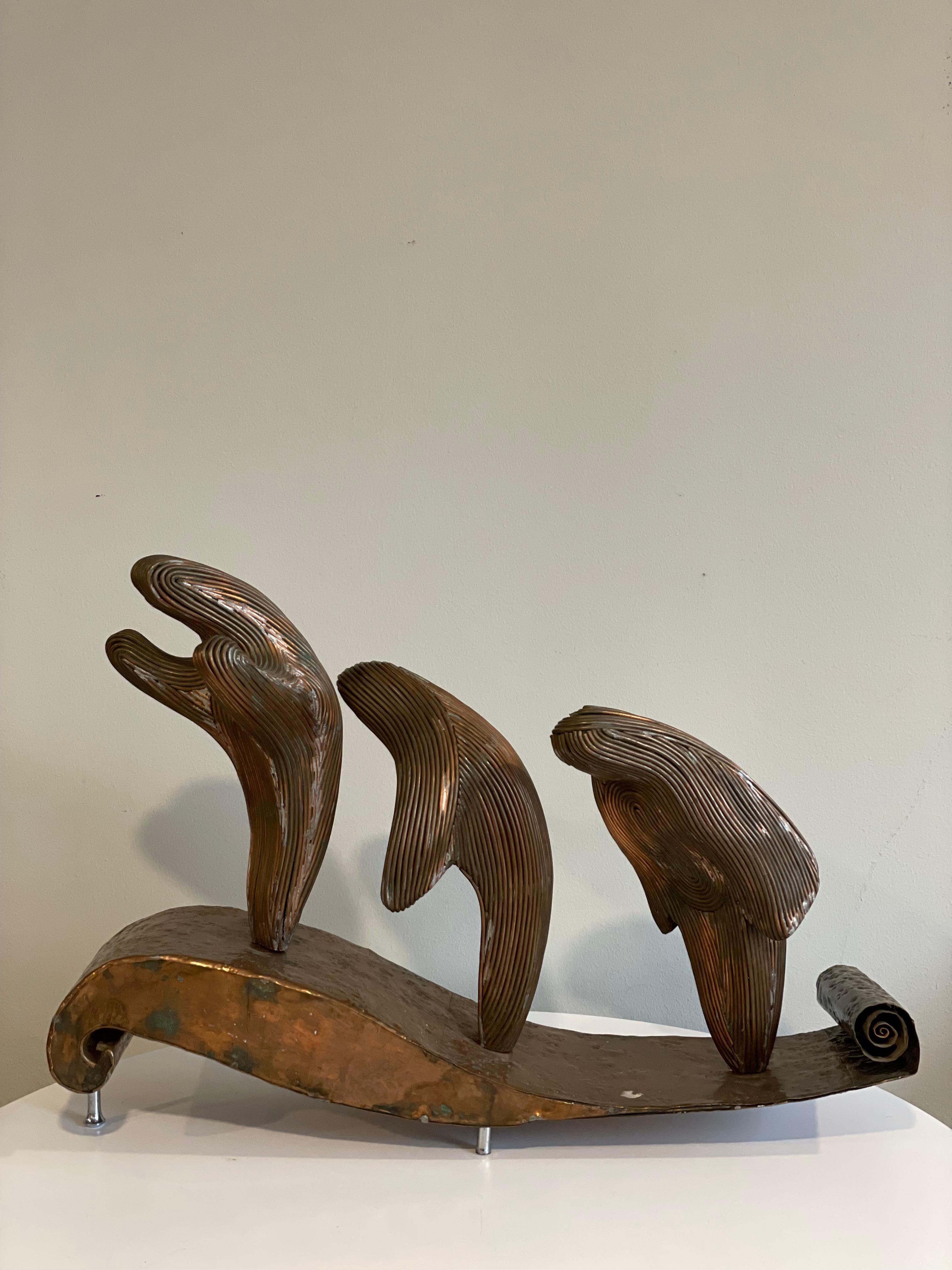 Beautiful MCM Collectible brass whale sculpture. Whales can swivel and are adjustable to your liking.