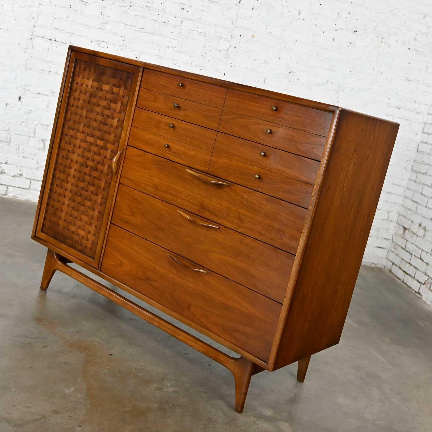 Wonderful Mid-Century Modern Lane Furniture console or dresser or chest of drawers designed by Warren Church for Lane’s Perception line collection. Comprised of walnut with brass and wood sculptured pulls. This piece is in fabulous condition keeping