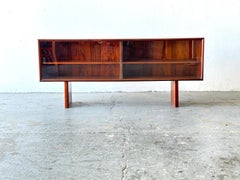 MCM Danish modern Rosewood Low Media Cabinet or Bookshelf display Case. By faaru