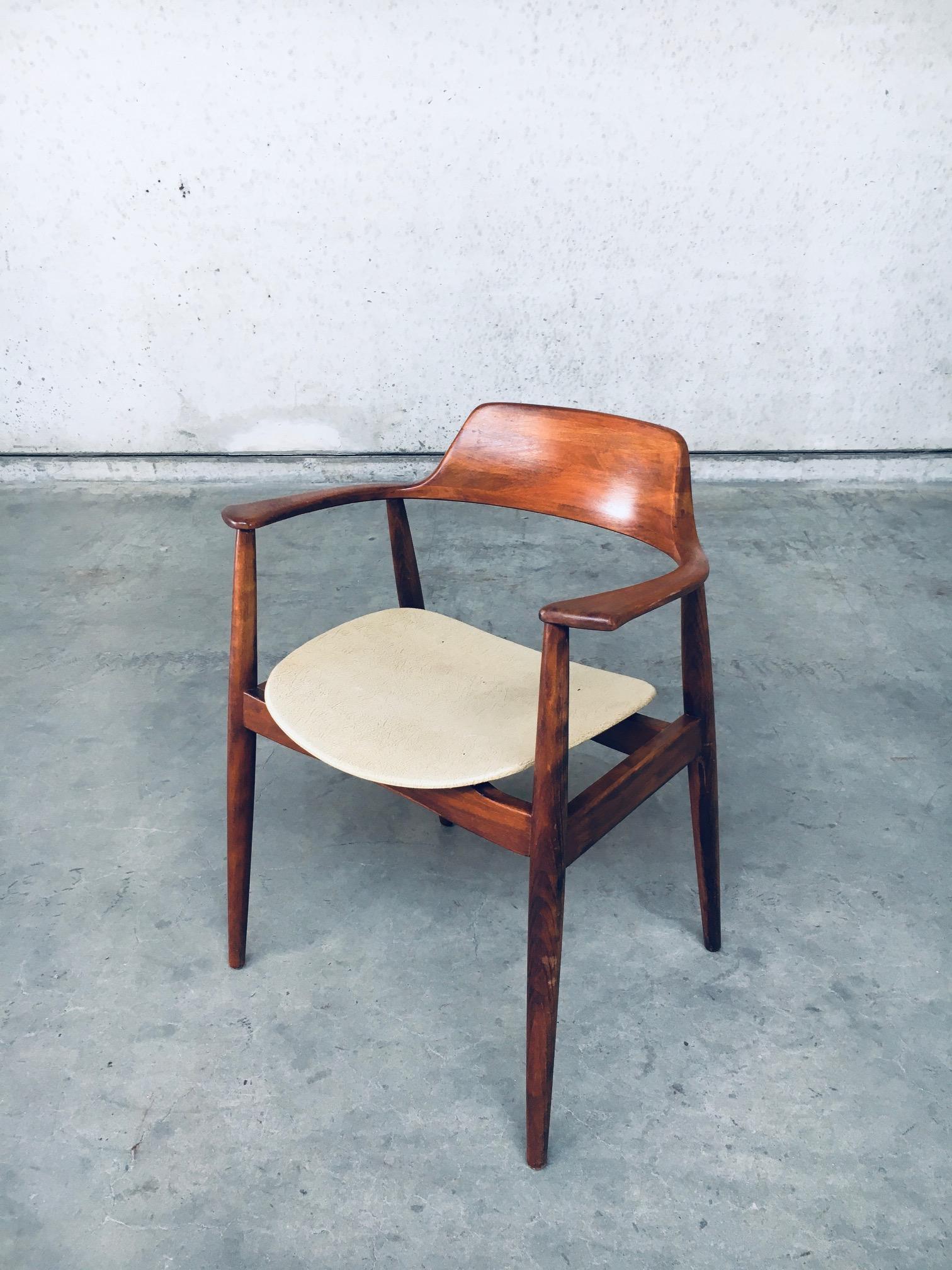 Vintage Rare Midcentury Modern Belgian Design 'JACAFONDA' Office Armrest Armchair by Ateliers Braun Fortuna, made in Gent, Belgium 1960's. Solid teak wood frame with simili faux leather covered seat. All original in used good condition. Simili faux