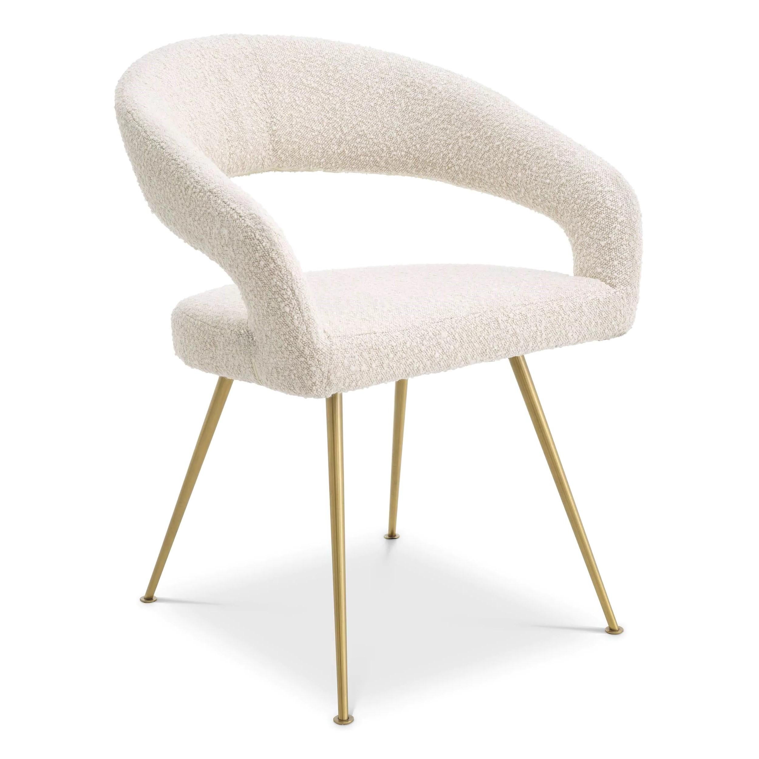 Beige Bouclé fabric and brass finishes dining chair.