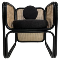 Used MCM Design Style Rattan and Wicker Large Armchair with Boucle Fabric Cushions