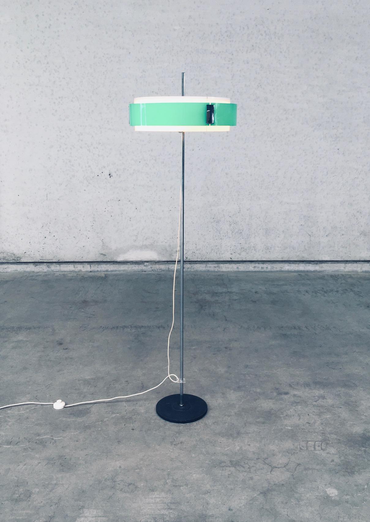 Vintage Midcentury Modern Dutch Design Floor Lamp by GEPO, Amsterdam, Netherlands 1960's. Chrome steel with steel black lacquered base and green and white perspex shade. A Space Age design. This comes in very good, all original condition. This