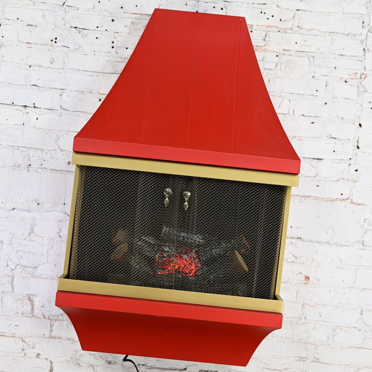 Chimenea eléctrica MCM Naranja con adornos dorados Atribuida Casa Estilo Montgomery Ward Moderno de mediados de siglo en venta