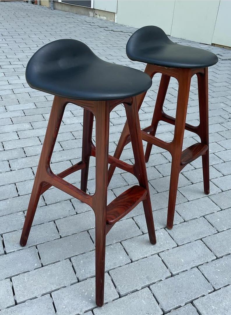Beautiful pair of Danish modern stools by Erik Buck. They're in very good condition! They're made in Denmark. 
