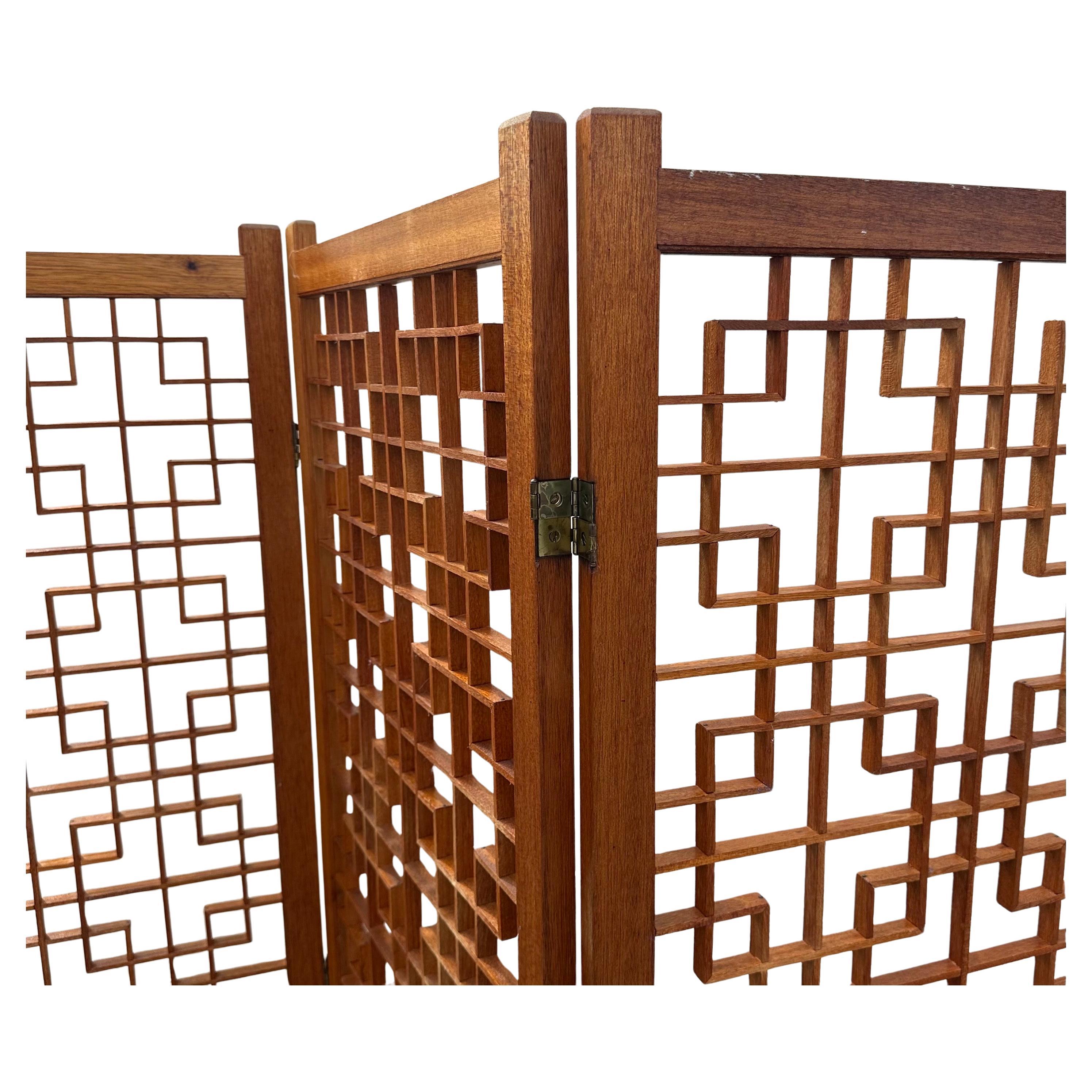 MCM Four Panel Teak Folding Screen with Square Lattice Design In Good Condition For Sale In San Diego, CA