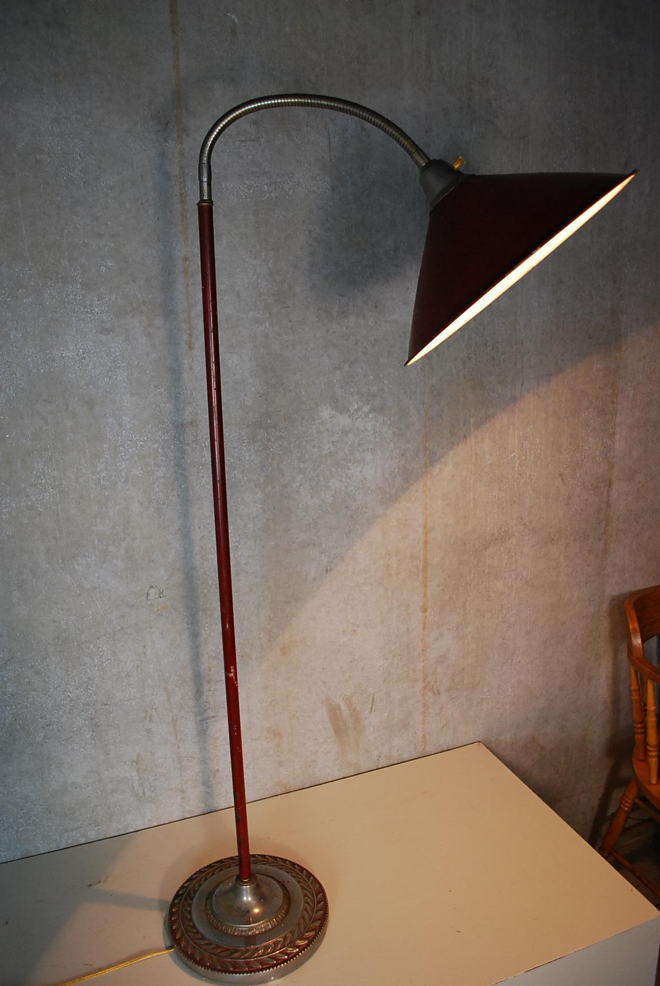 Beautiful working floor lamp in old red finish from a private collection. Excellent detailed base with some brass hi-lites.
Maker unknown.

  