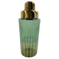 MCM - Cocktailshaker aus grünem Glas mit goldener Gitterdekoration am Sockel und goldenem Deckel