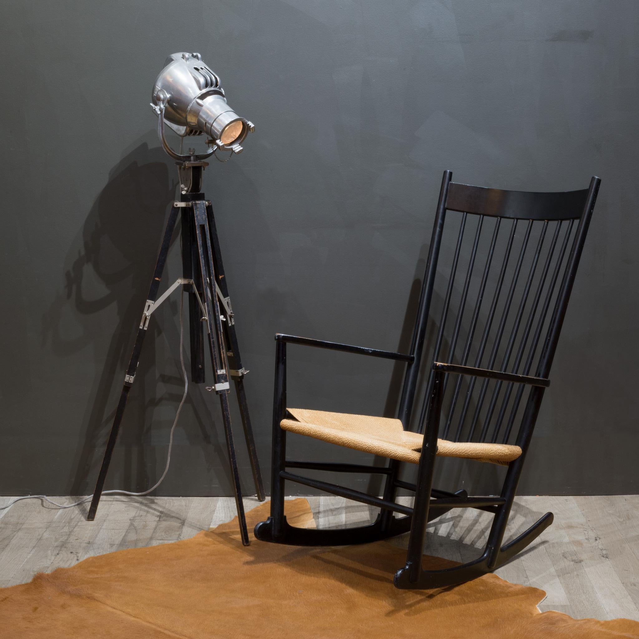 ABOUT

An original J-16 rocking chair by Hans Wegner. A Danish update off the classic Windsor silhouette with elongated turned spindles, braided papercord seat, and matte black lacquered finish. Original maker's mark underneath.

 CREATOR Hans J.