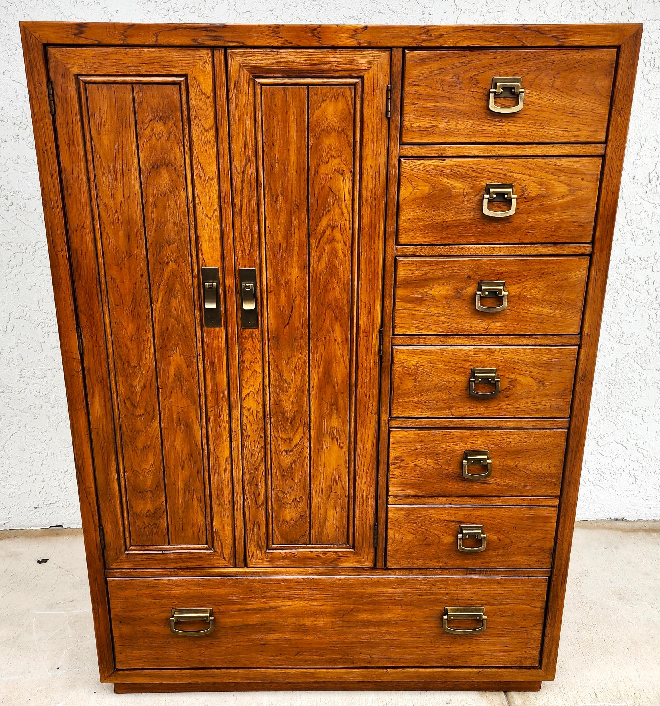 For FULL item description click on CONTINUE READING at the bottom of this page.

Offering One Of Our Recent Palm Beach Estate Fine Furniture Acquisitions Of A
MCM Highboy Dresser Wardrobe WINDWOOD by Drexel
Shelves are adjustable/removable.

We also