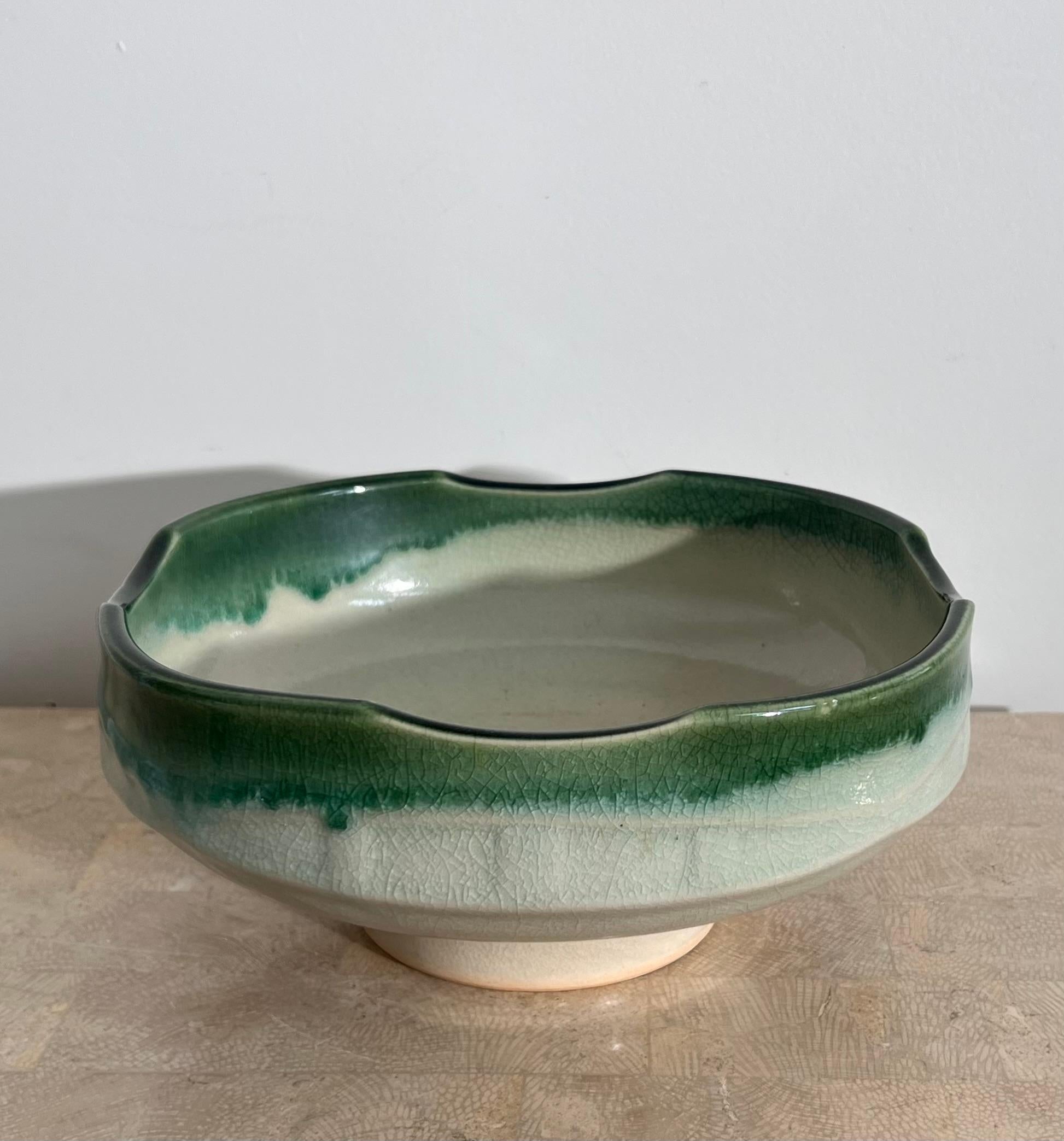 A large crackle ceramic fruit or serving bowl, made in Japan circa late 1960s. Tones of seafoam and grass green. A slightly rounded square shape. Wonderful condition. Pick up in LA or worldwide shipping available.
Dimensions: 9.5” W x 9.5” D x 4.5”