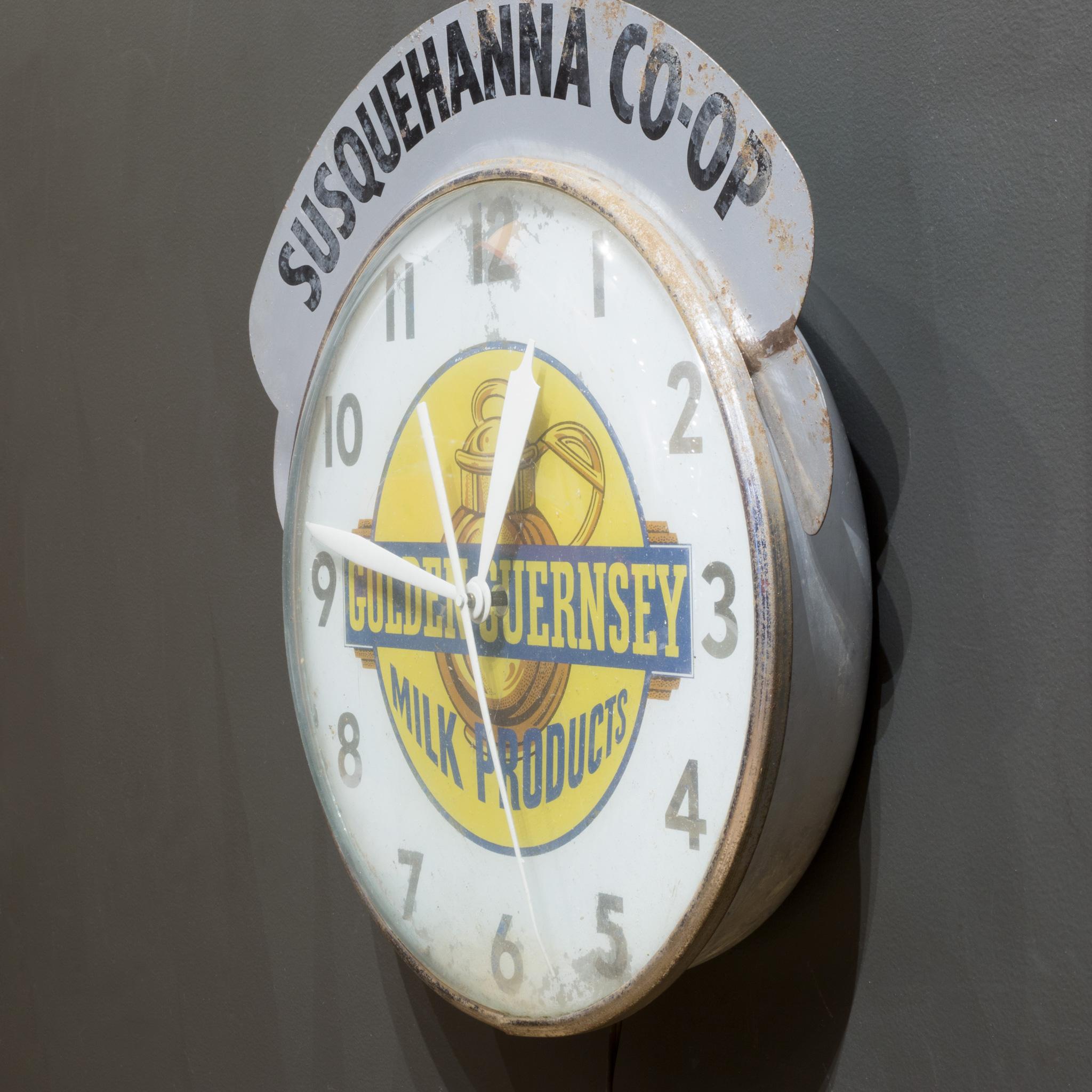 Orologio da parete pubblicitario MCM illuminato 