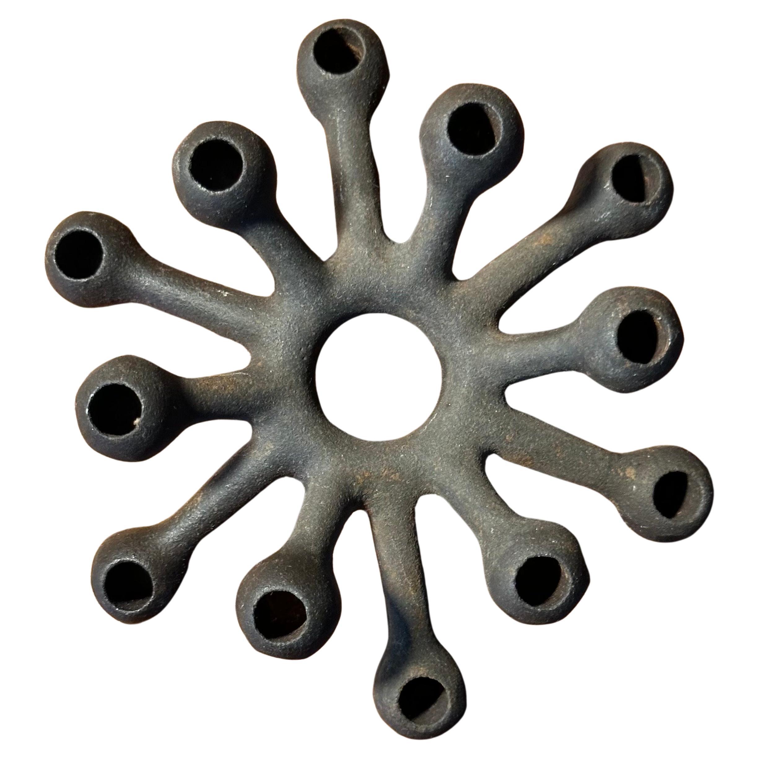 MCM Iron candle holder in ox by Dansk Designs, circa 1950s.  The piece holds twelve narrow candles and is in good vintage condition.  it measures 4.25