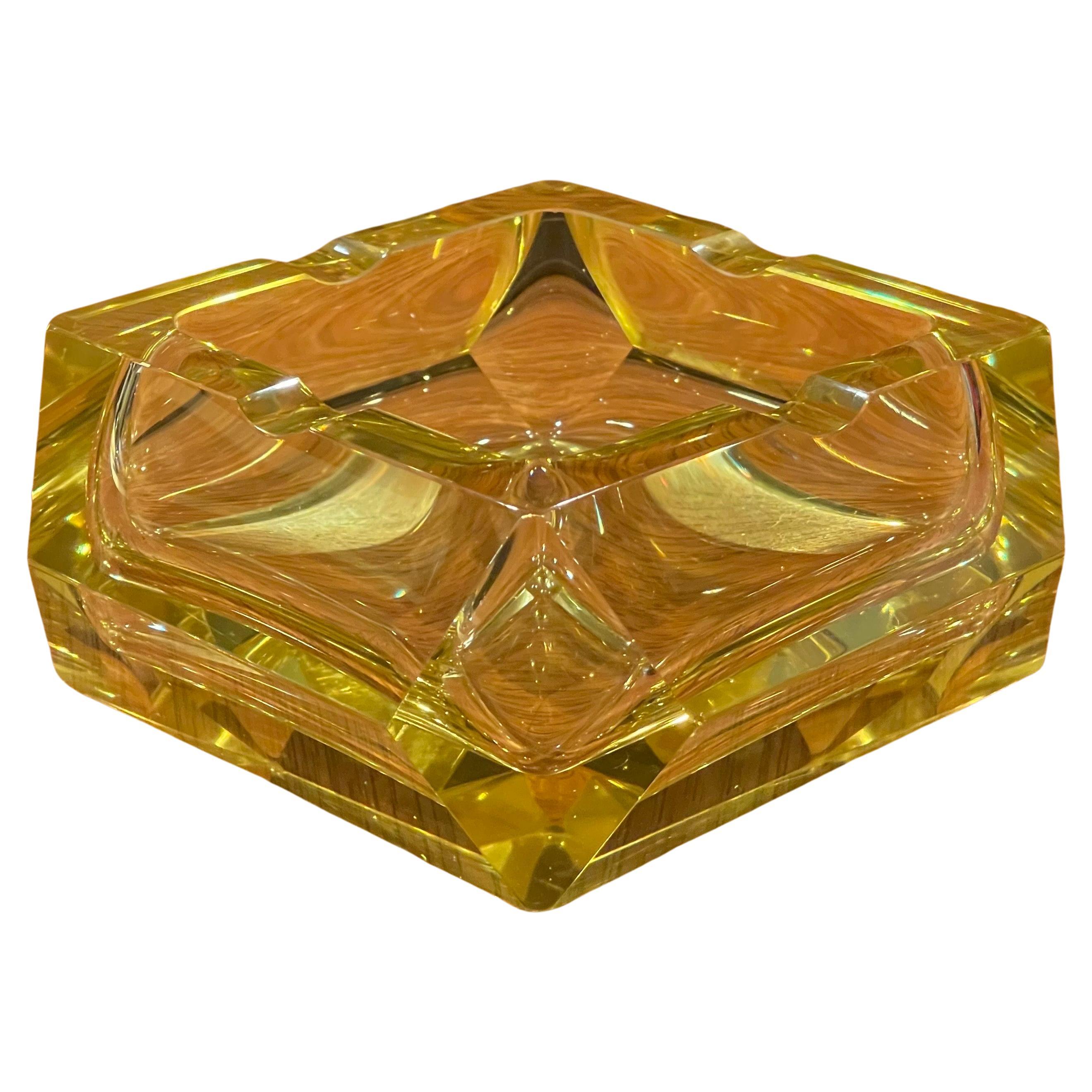 Gorgeous large and heavy yellow crystal ashtray by Moser Glassworks, circa 1960s. The piece is in very good vintage condition with no chips or cracks and measures 5.5