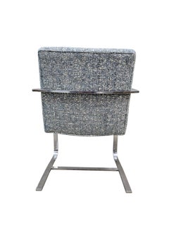 MCM. Milo Baughman Chrome Sculptural Cantilever Armchair and Ottoman