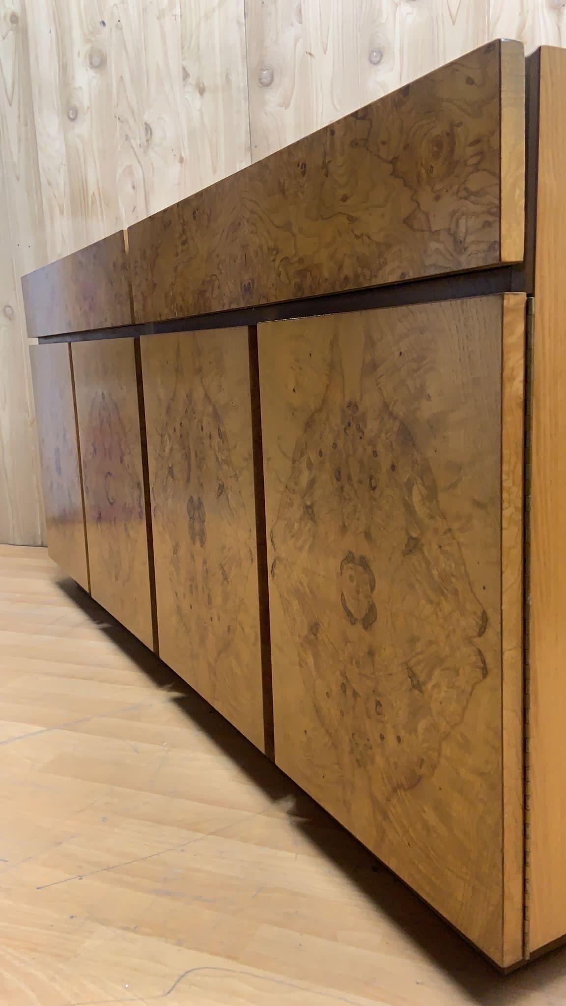 Mid-Century Modern Milo Baughman for Lane Furniture Burl Olive Wood Sideboard/Credenza

Exquisite MCM Milo Baughman for Lane Furniture Burl Olive Wood 4 Door Sideboard/Credenza with 2 top drawers. 

Standing the Test of Time, Not Only in Quality