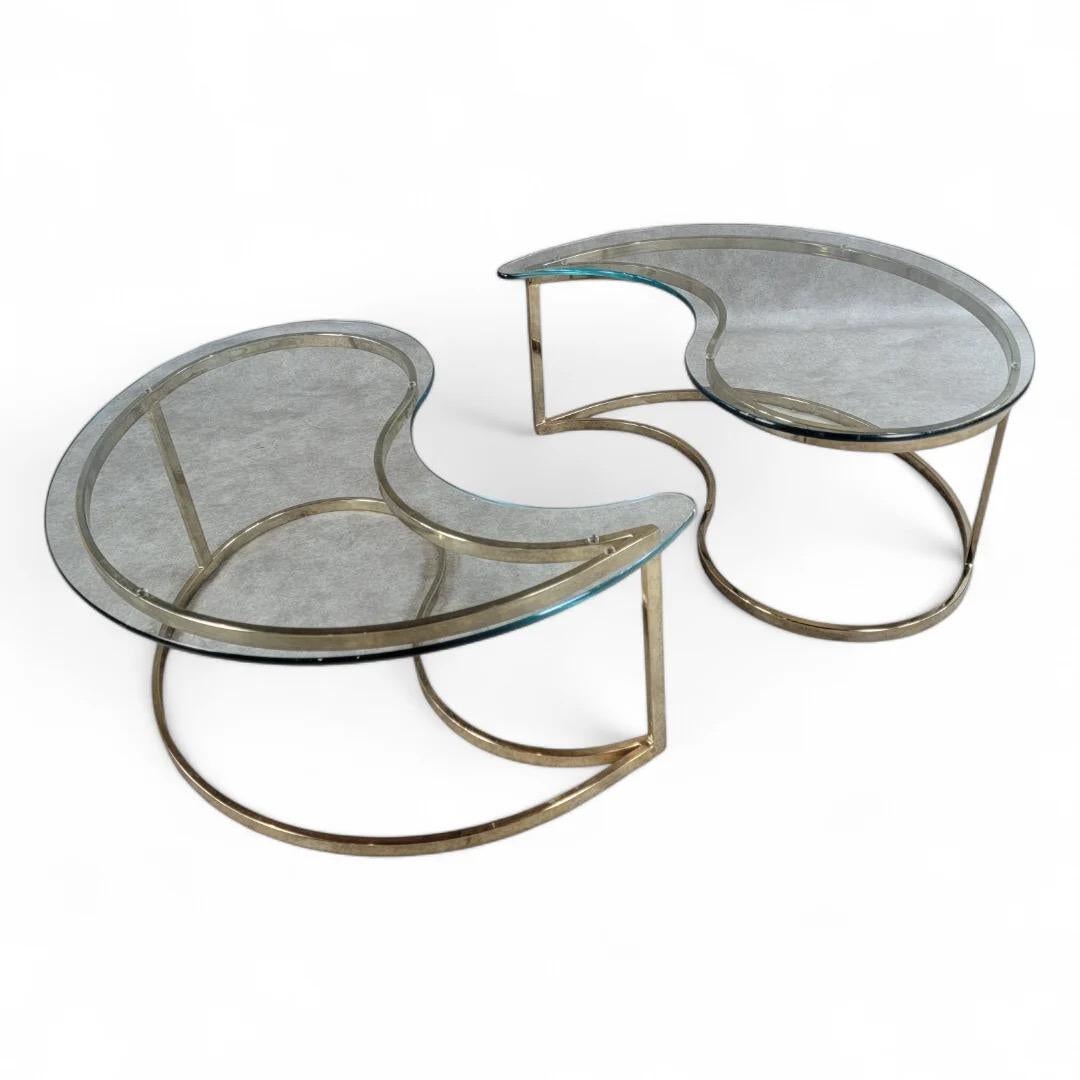 Mid century Modern Milo Baughman Style Brass Finish Flat Bar Base Tear Drop Ying/Yang Glass Top Coffee/Side Tables for DIA

This coffee/side table embodies the essence of MCM design, featuring a brass finish flat bar base that offers both stability