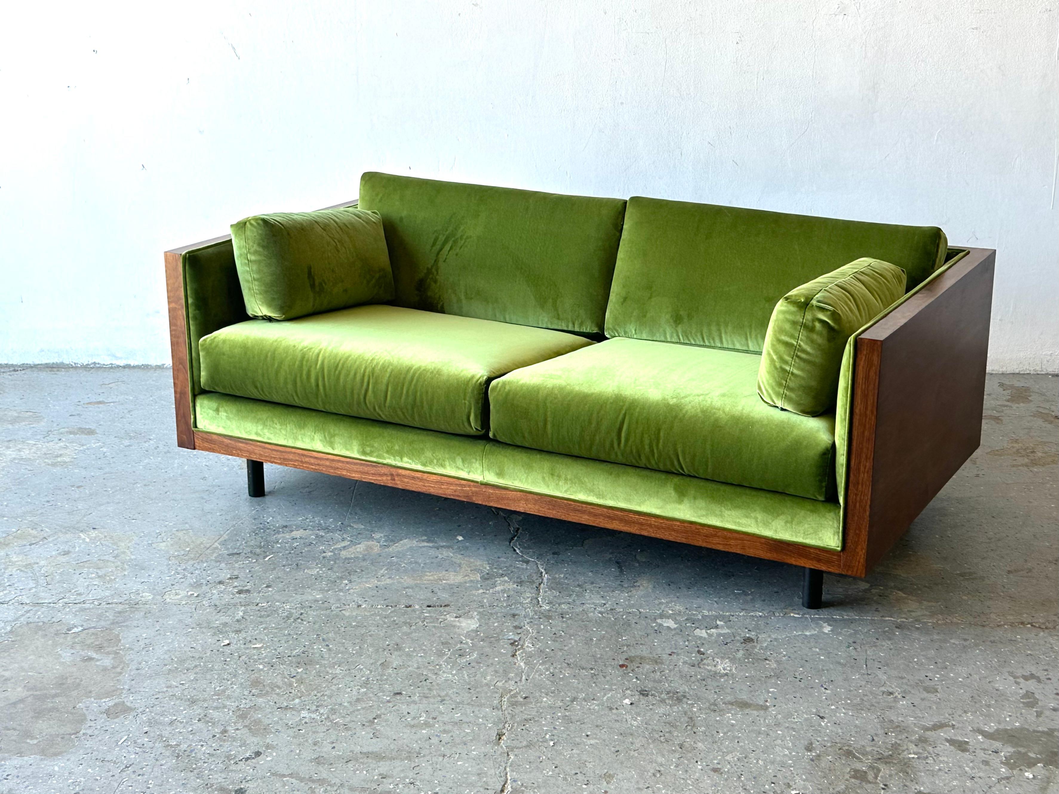 MCM Milo Baughman style walnut Green Velvet Case Loveseat Sofa
A gorgeous Mid-Century Modern walnut case reupholstered in very soft, lush green velvet. Loveseat is in the style of Milo Baughman. Professionally refinished. Newly