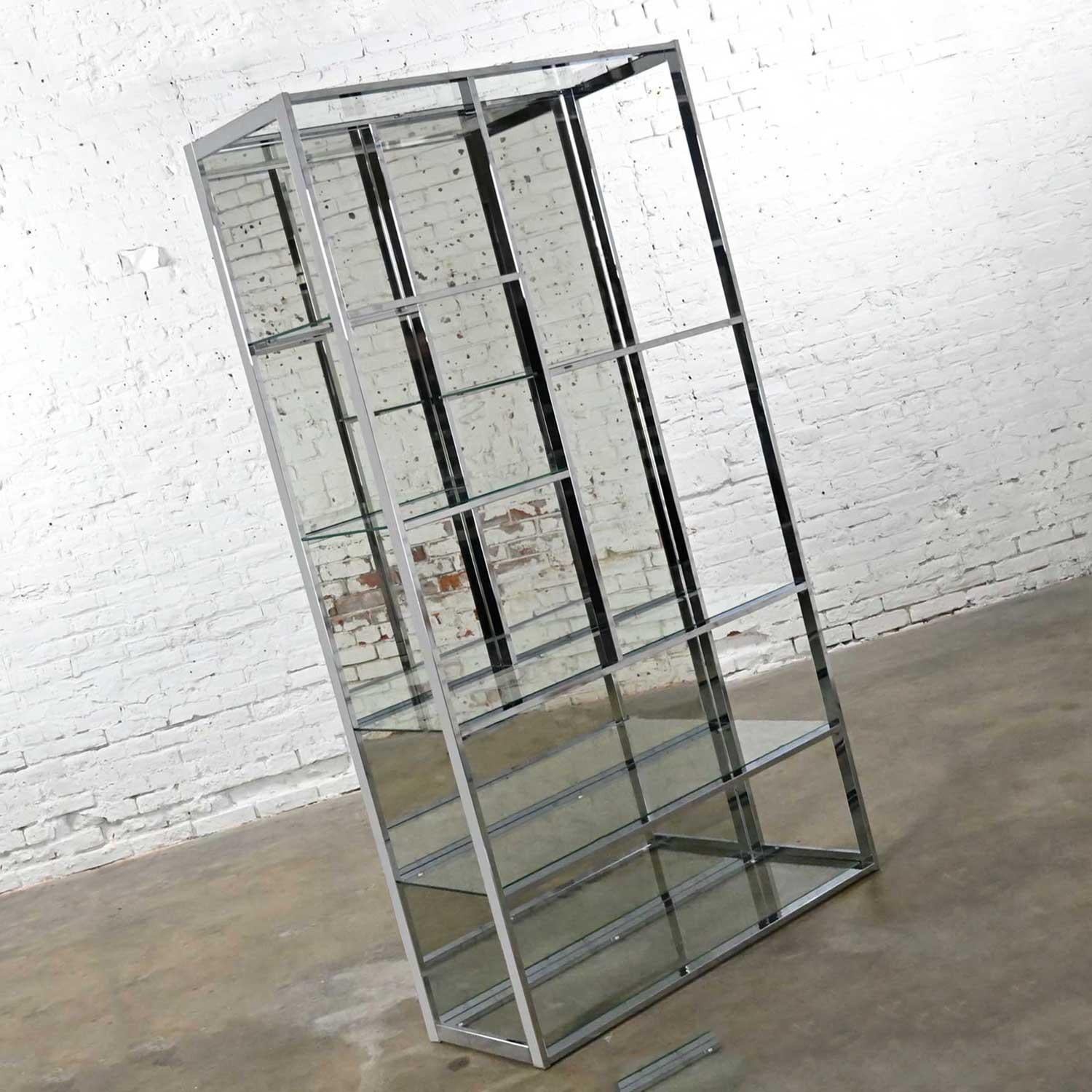 Gorgeous vintage mid-century modern to modern chrome and glass etagere with optional full-length mirror for the back in the style of DIA or Design Institute of America. Beautiful condition, keeping in mind that this is vintage and not new so will