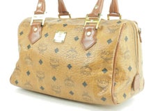 MCM - Sac à main Visetos Boston 231455 en toile enduite cognac avec monogramme