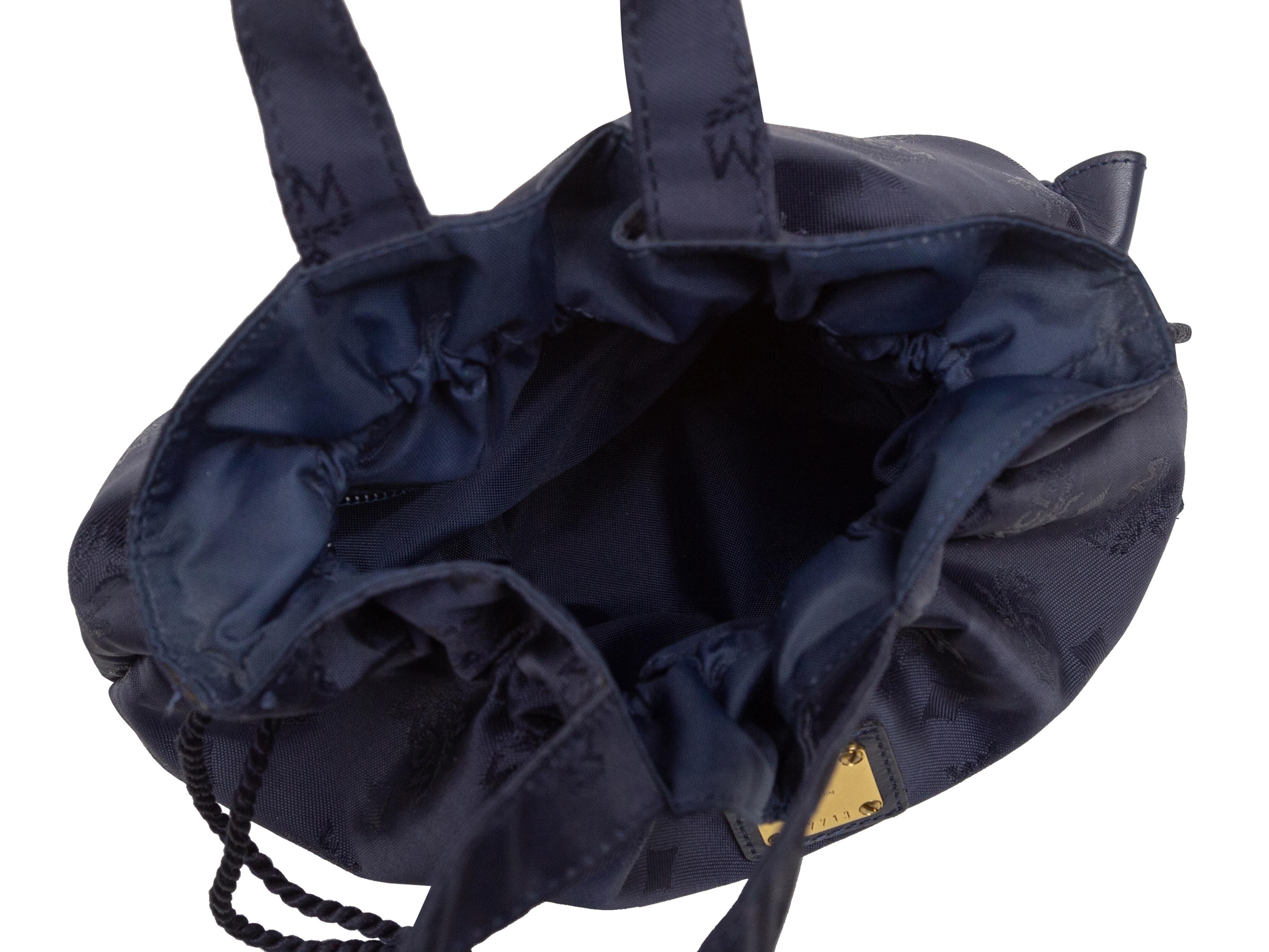 Product details: Vintage navy Saphir Nylon Drawstring Bag by MCM. Gold-tone hardware. Dual handles. Drawstring closure at top. 10