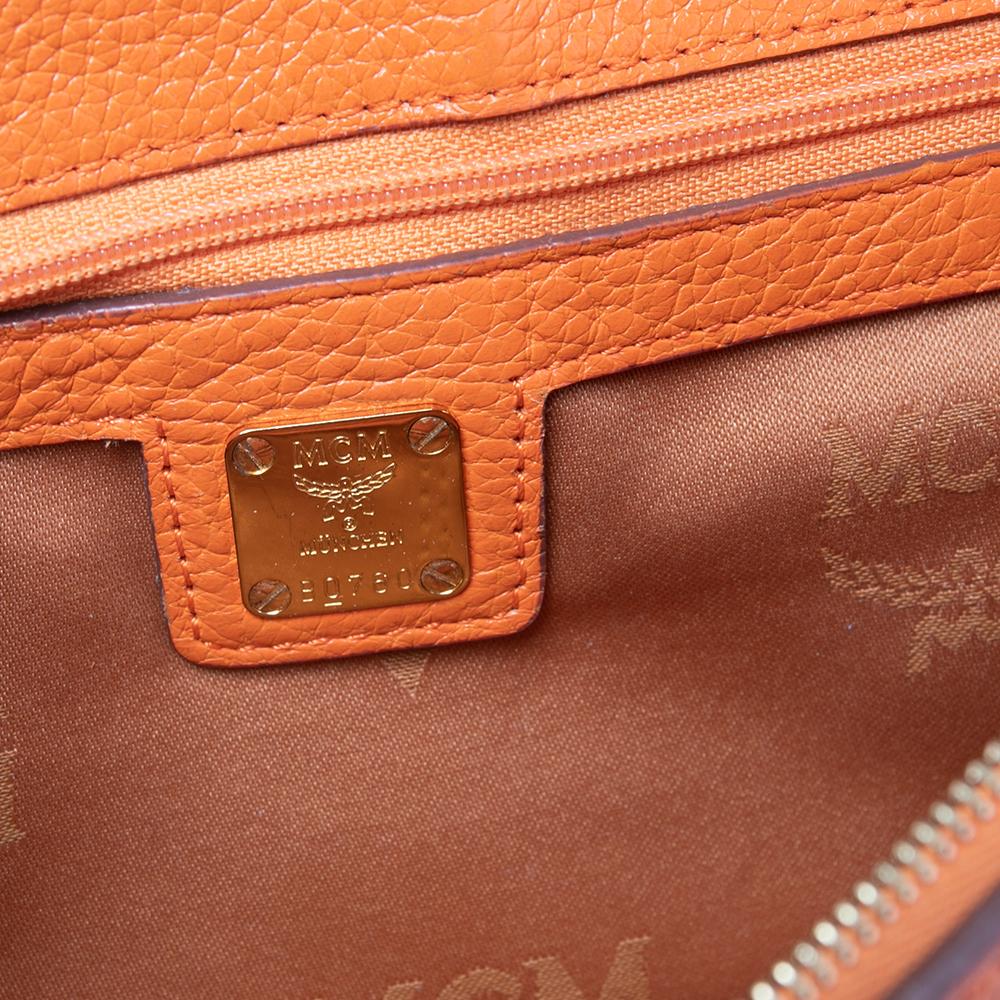 MCM Orange Leather Studded Flap Top Handle Bag In Good Condition In Dubai, Al Qouz 2