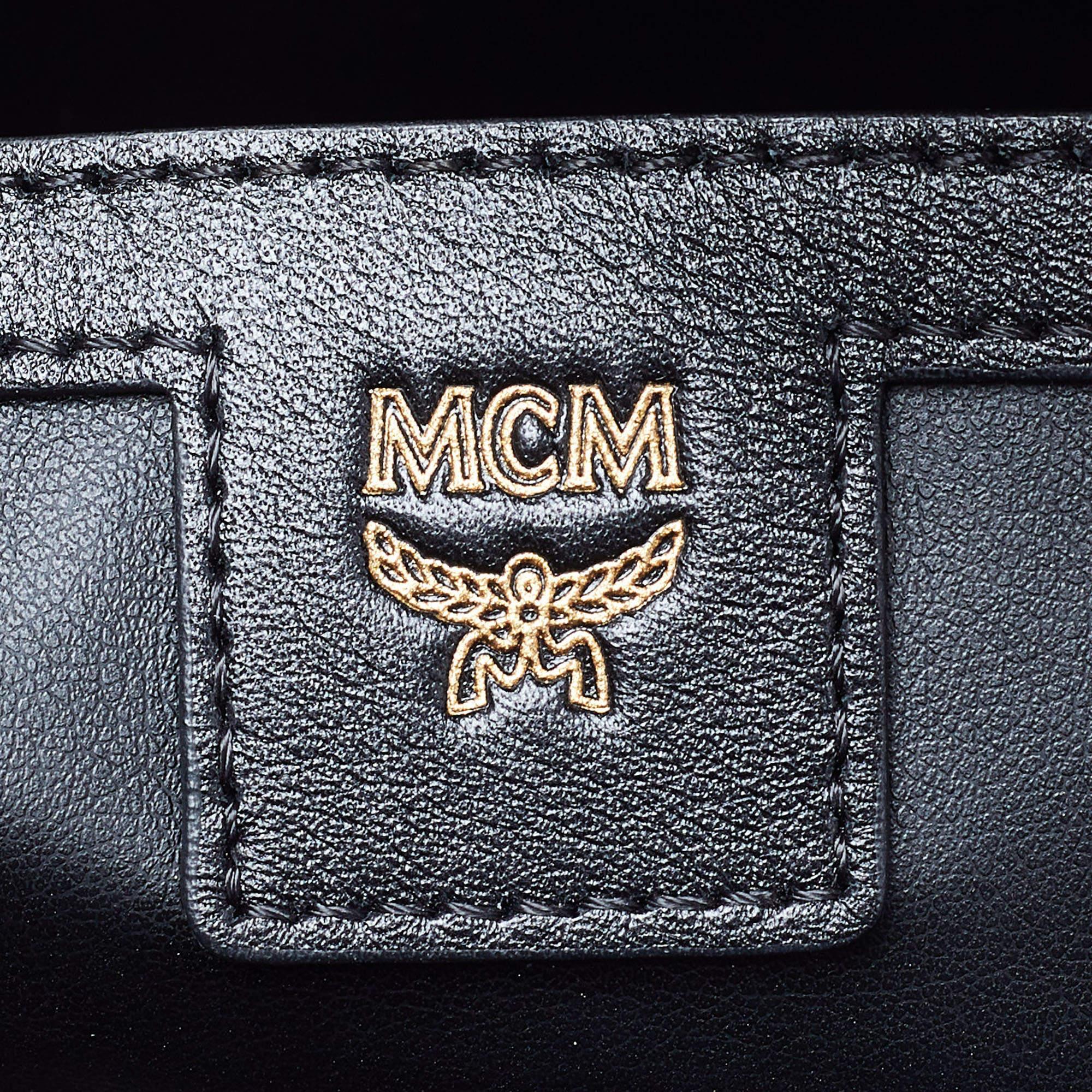 MCM Rosa/schwarzer Rucksack aus beschichtetem Canvas und Leder mit Dual Stark im Angebot 6