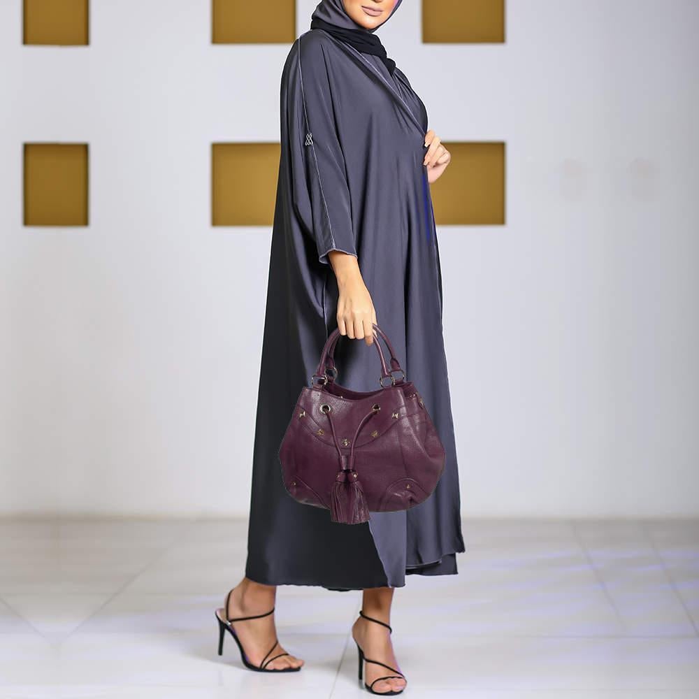 Designer bags are ideal companions for ample occasions Here we have a fashion meets functionality piece crafted with precision. It has been equipped with a well sized interior that can easily fit your small essentials.