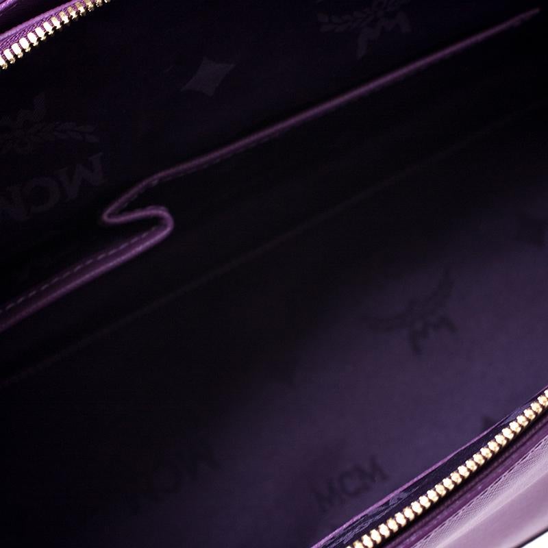 purple mcm bag