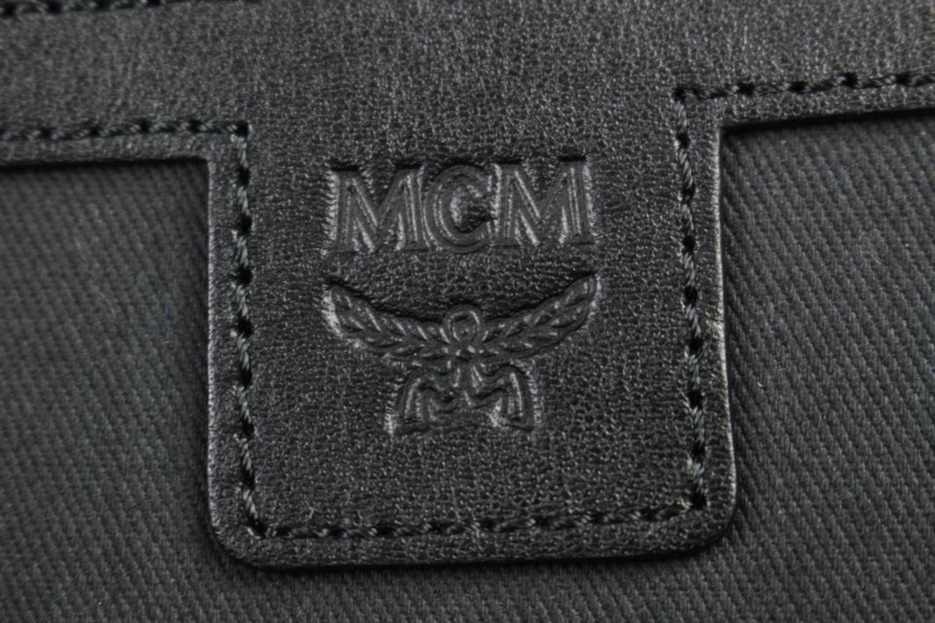 MCM Quilted Embossed Bionic 232006 Black Leather Backpack For Sale 8