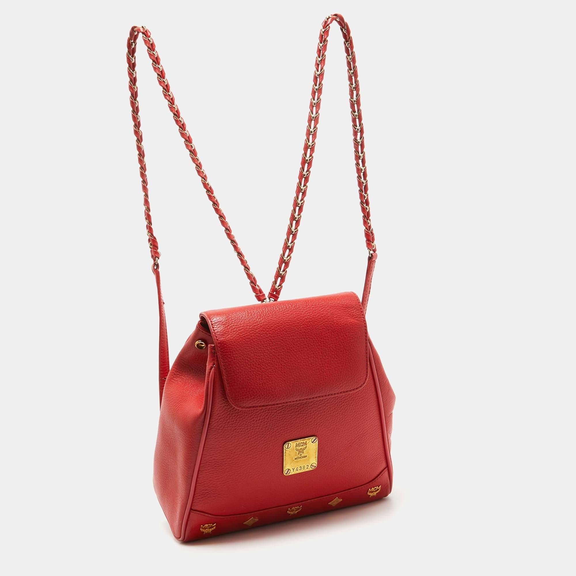 MCM Red Leather Studded Flap Backpack In Good Condition For Sale In Dubai, Al Qouz 2
