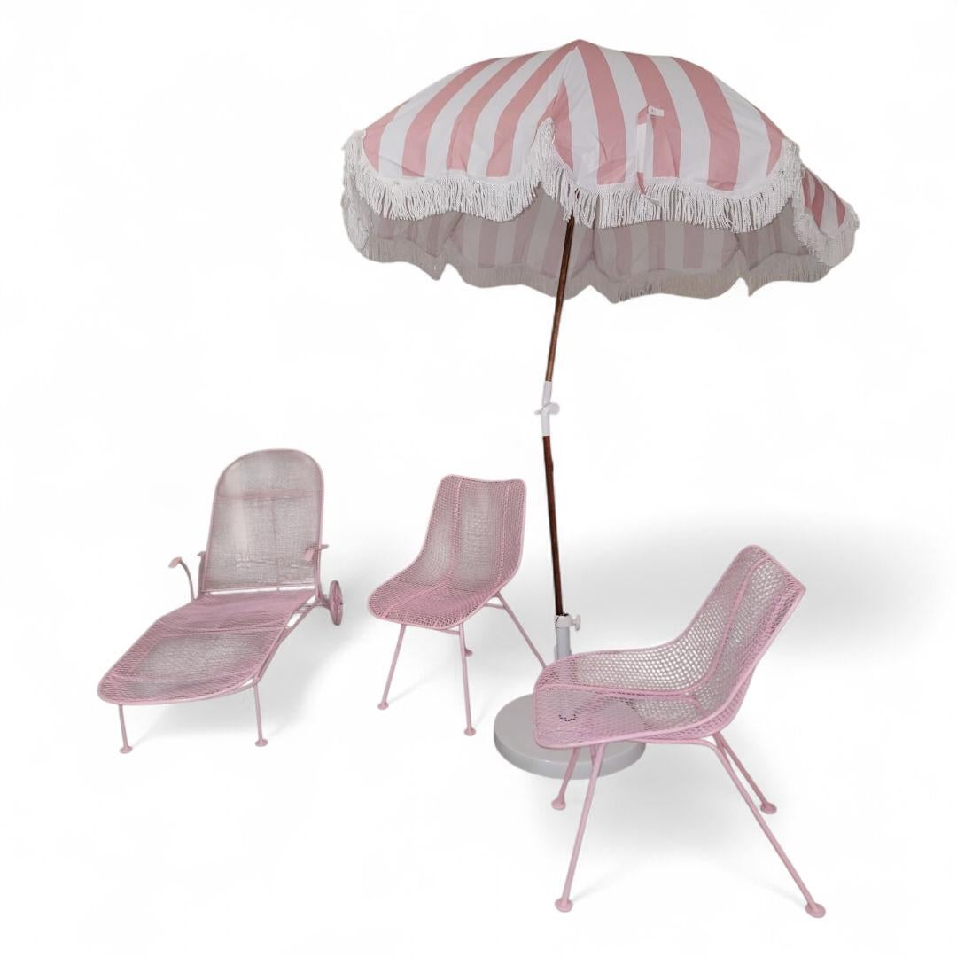 Mid Century Modern Russel Woodard Style Wire Mesh Sculptural Collection Patio Chairs, Pool Lounge Chair and Pink and White Striped Umbrella

Elevate your outdoor space with the Mid Century Modern Russell Woodard Style wire mesh sculptural