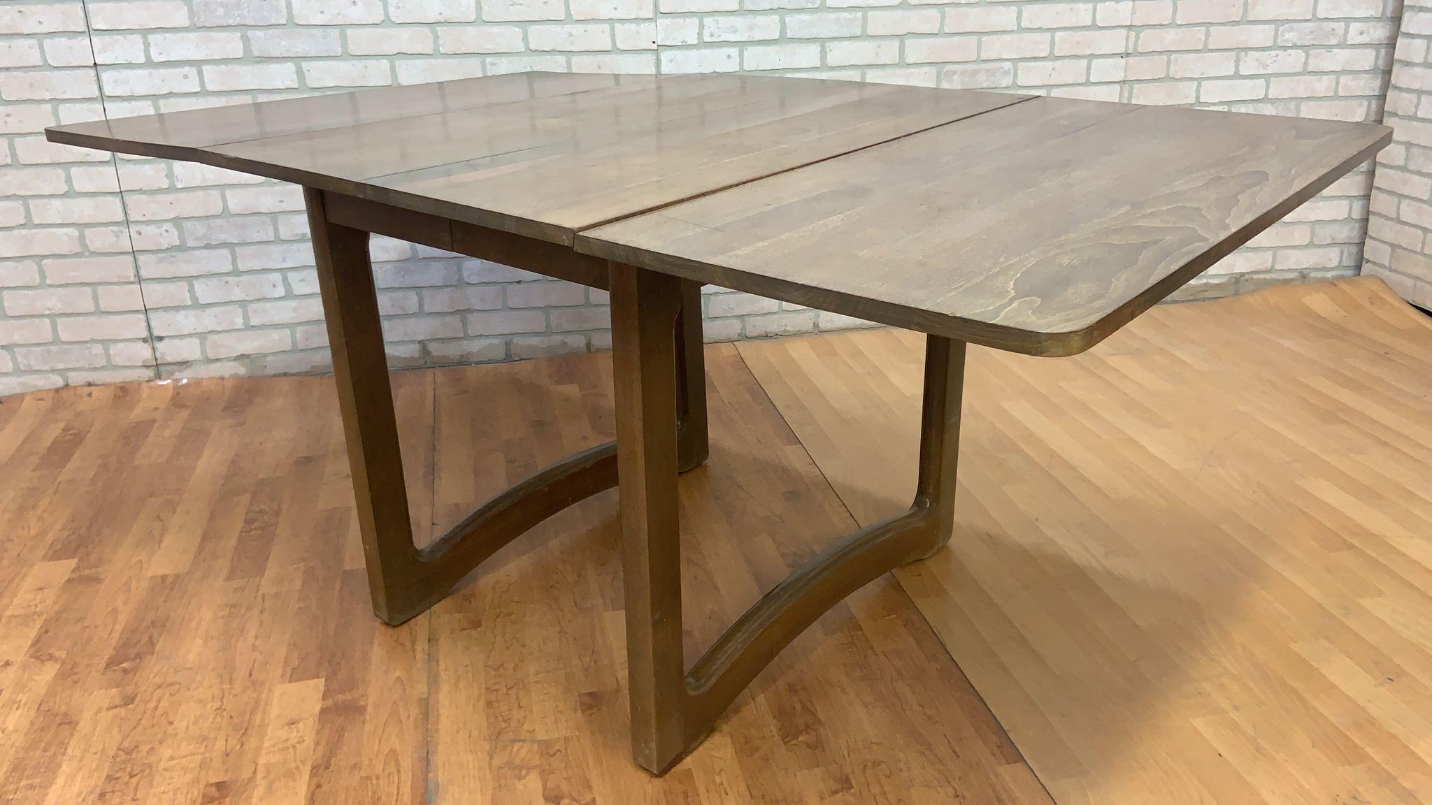 Mid Century Modern Scandinavian G-Plan Style Walnut Fold Down Dining Table and 6 Dining Chairs in Original Fabric - 7 Piece Set 

The wood will be cleaned up prior to shipping. 

Circa 1970

Dimensions: 

Table
H 30”
W 65” when opened
W 37” when