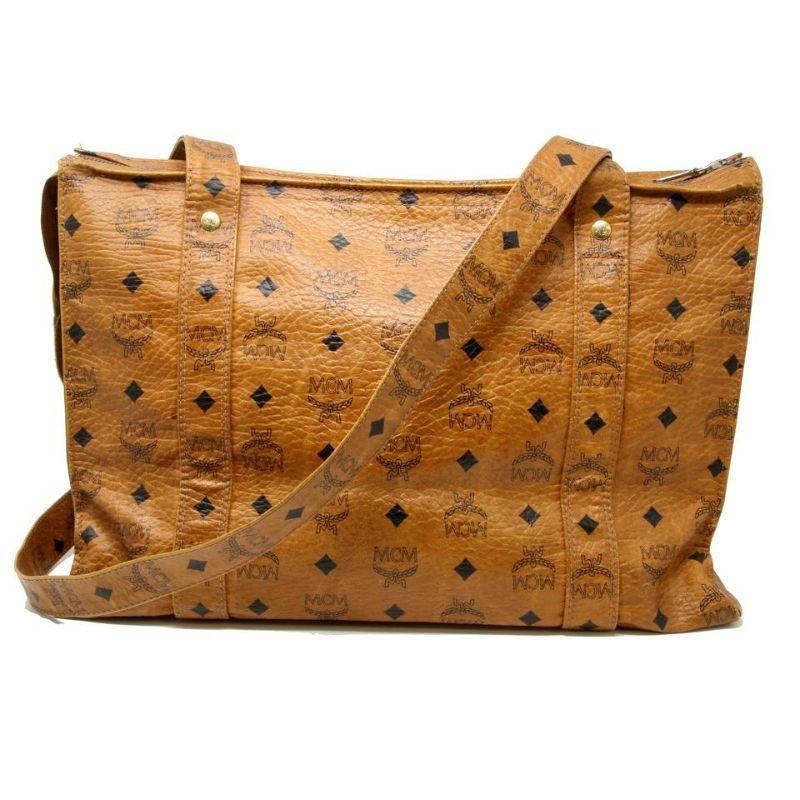 MCM Signature Monogram Cogna Travel Leather Shoulder Bag MC-0829N-0005

Beautiful large MCM, Modern Creation Munich Germany finest leather products founded in 1976 in Munich, Germany. The brand's MCM logo pattern, called Cognac printed all over the