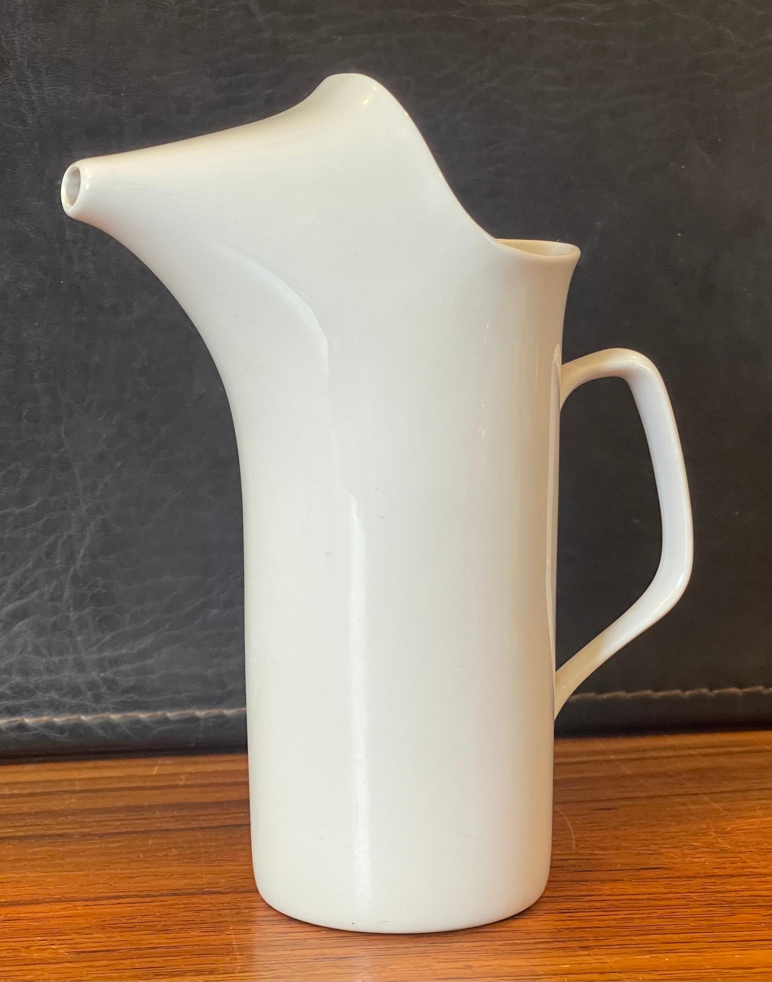 Beautiful MCM small ironstone porcelain pitcher (creamer) by Lagardo Tackett for Schmid, circa 1950s. The piece is in very good vintage condition with no chips or cracks and measures 5