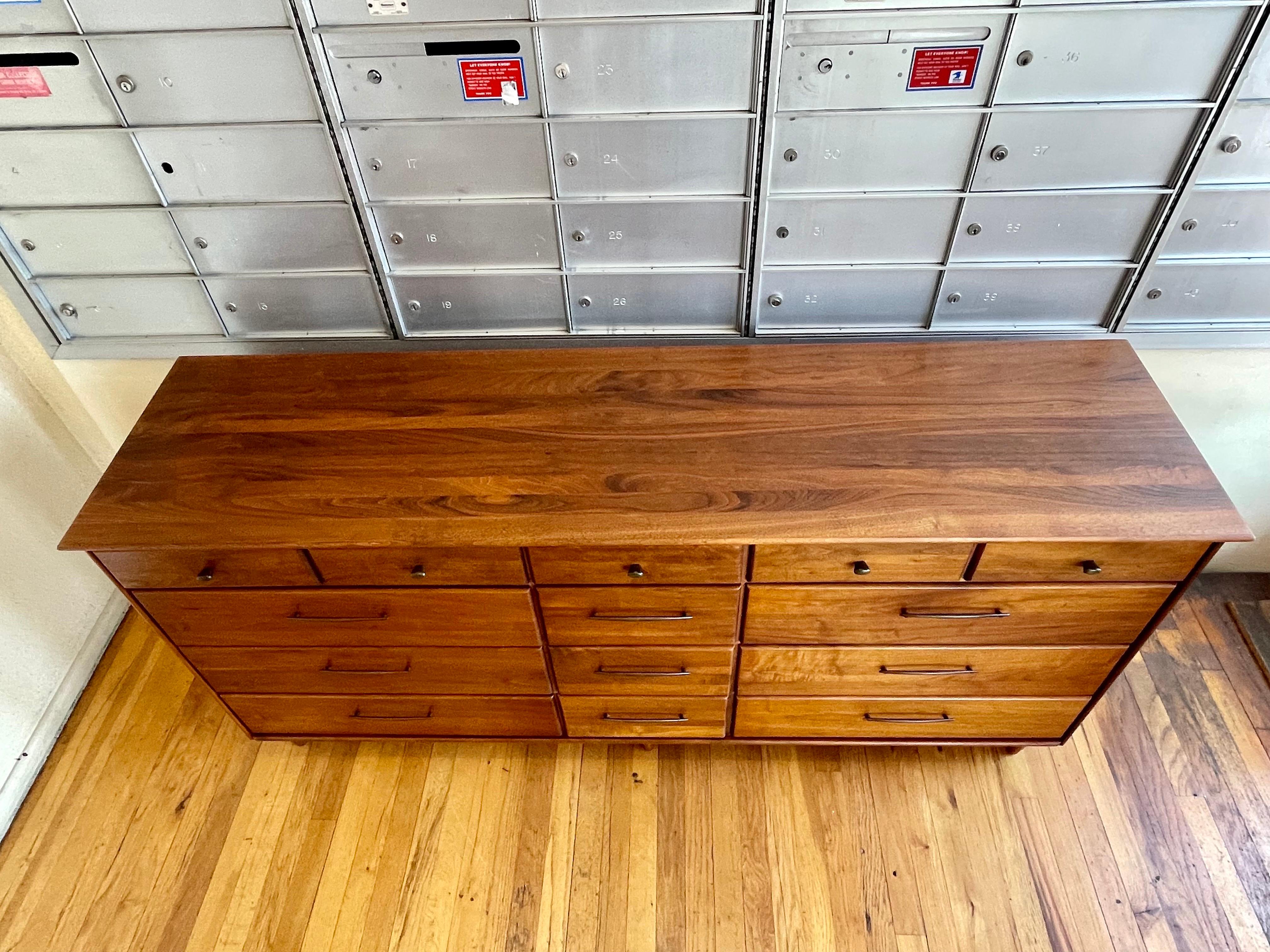 walnut accent cabinet with 14 drawers