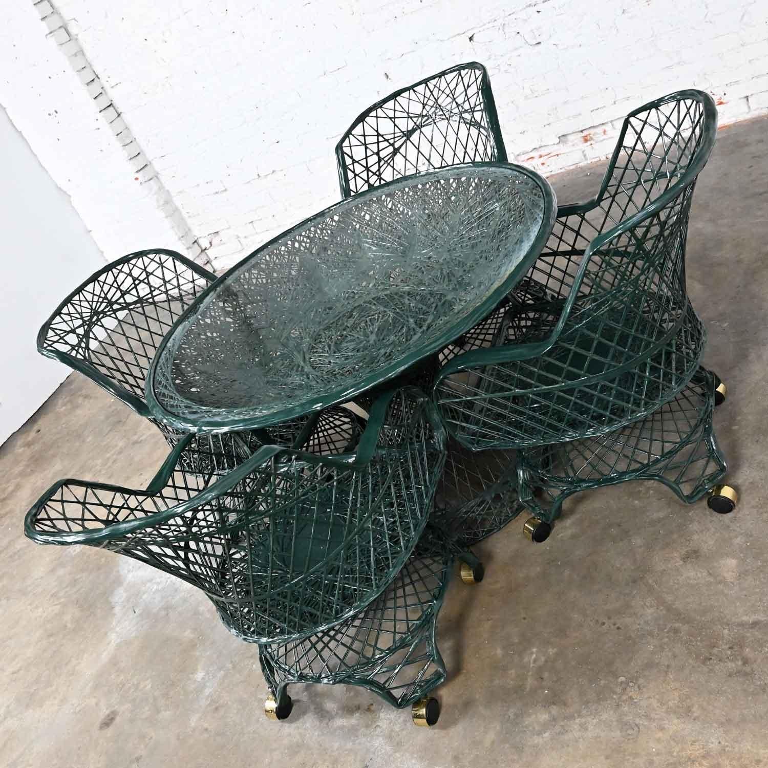 American MCM Spun Fiberglass Forest Green Outdoor Dining Table & 4 Armchairs on Casters For Sale