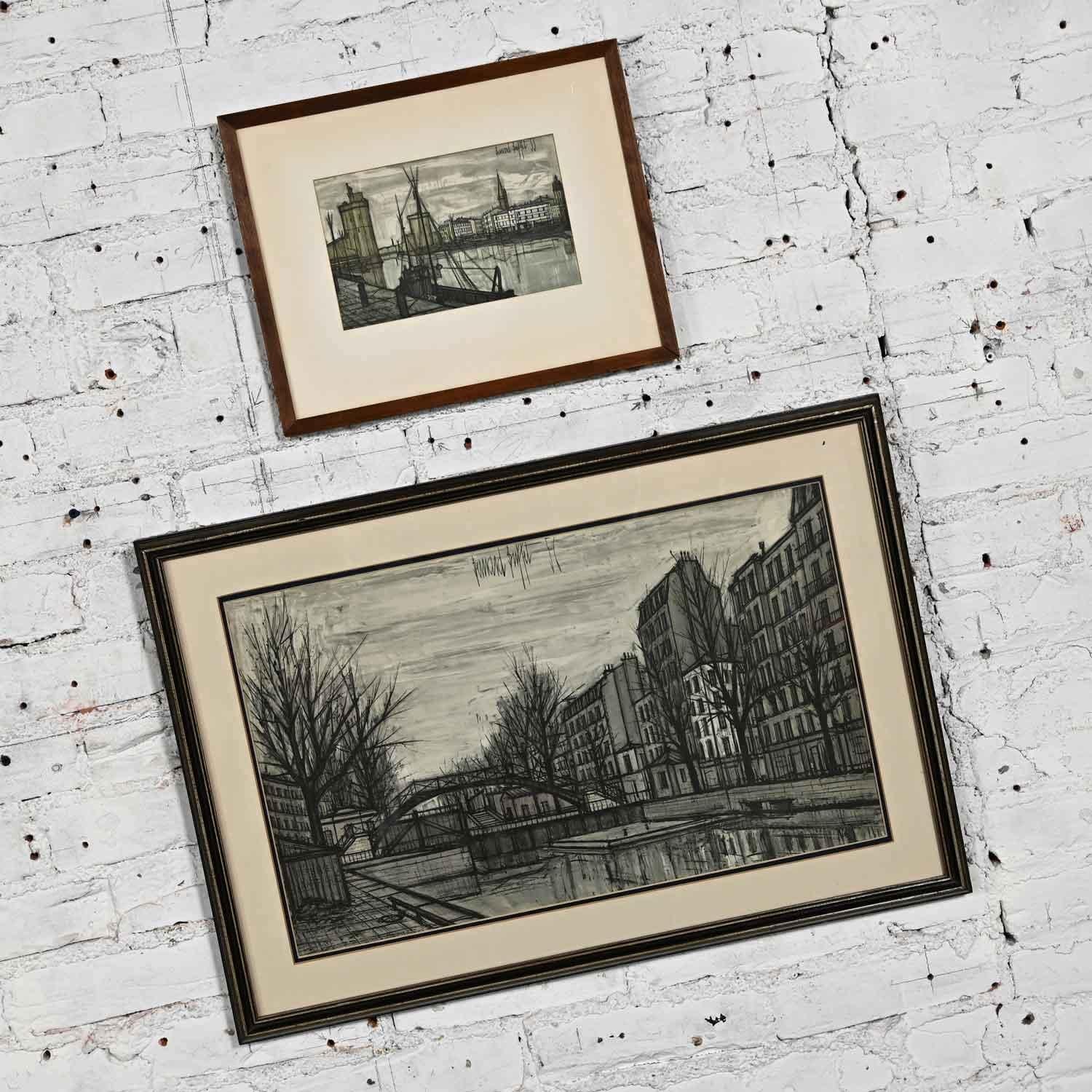 Fabulous vintage MCM or Mid-Century Modern “St. Martin Canal” and “France Port de La Rochelle” Bernard Buffet Lithograph framed and matted prints. These vintage prints are signed and dated in the printing process but do not have original pencil