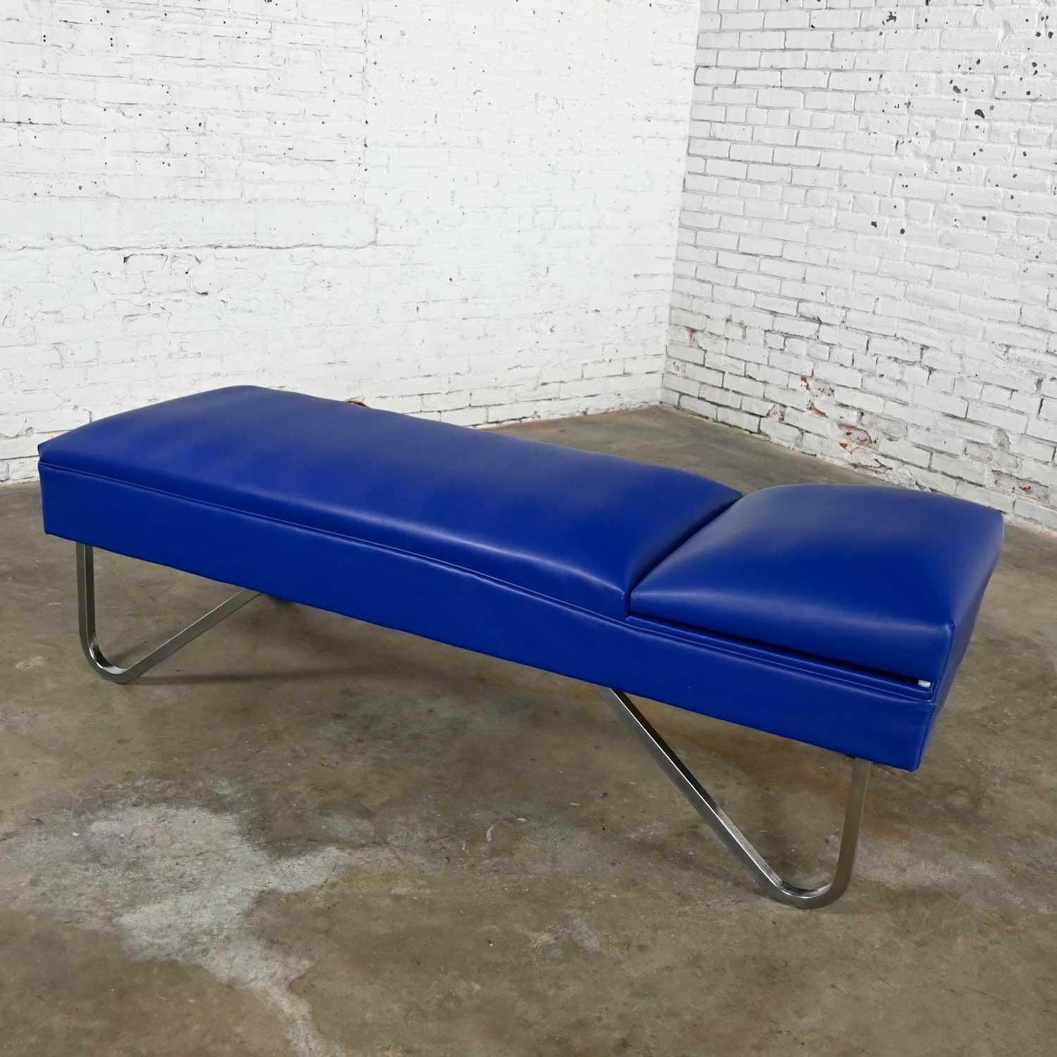 Handsome streamline modern, Mid-Century Modern, or Industrial style royal blue & vinyl or faux leather and chrome chaise or daybed with adjustable head or back rest. Wonderful condition keeping in mind that this is vintage & not new so there will be
