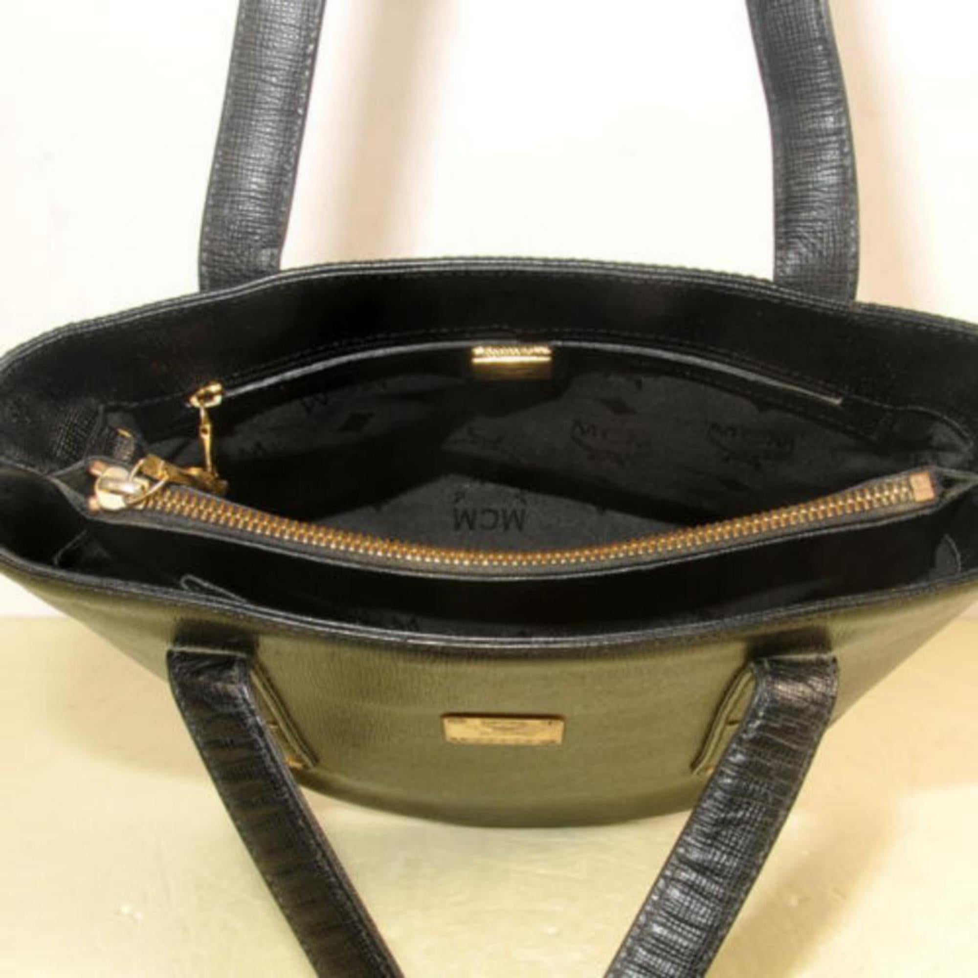 MCM Studded Bucket 868497 Black Coated Canvas Tote In Good Condition For Sale In Forest Hills, NY