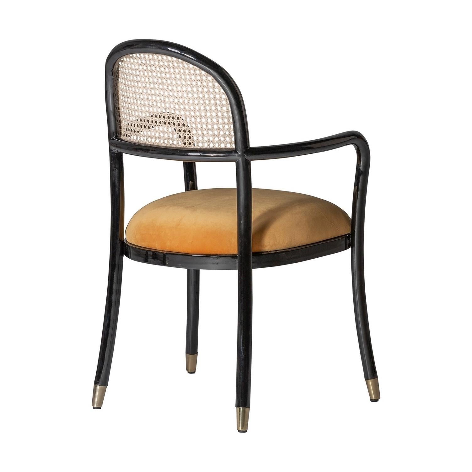 MCM Design Style black lacquered and curved wooden structure adorned with a rattan wicker cane back and velvet seat with gilded metal finish. Around the dining table, it will be perfect around your desk too!